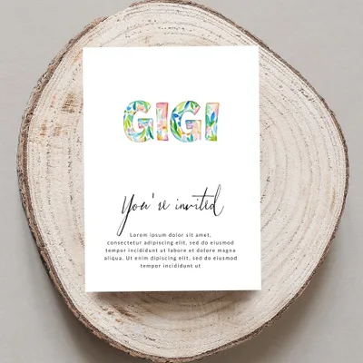 GIGI invitation with floral letters and placeholder text.