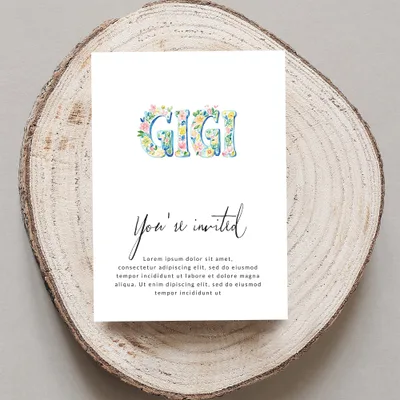 GIGI invitation with floral letters, reading "You're invited" and placeholder text.