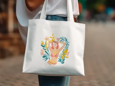 White tote bag with watercolor illustration of woman in bikini and floral wreath.