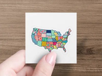 United States map sticker with colorful floral and geometric patchwork pattern.