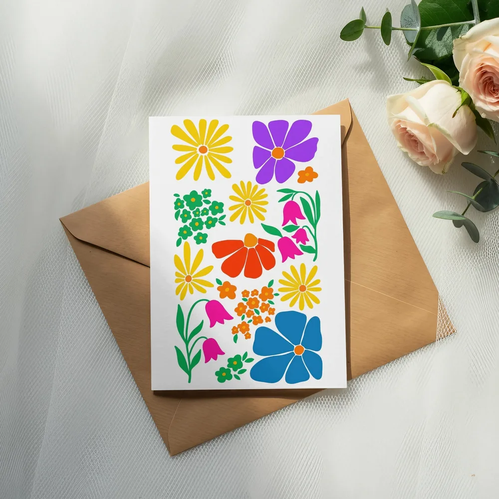 Card with colorful floral illustrations on a brown envelope.
