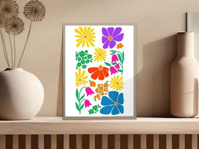 Framed print of colorful abstract flowers in yellow, purple, orange, and blue.