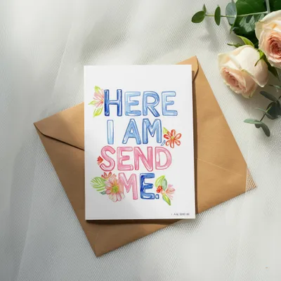 Card with "HERE I AM SEND ME" in watercolor letters, on an envelope.