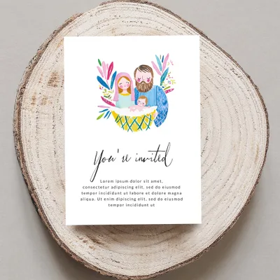 Invitation with watercolor illustration of a family and baby in a manger.
