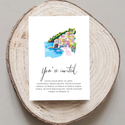 Invitation card with colorful seaside village illustration and "You're invited" text.