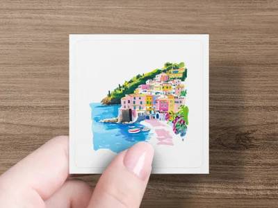 Watercolor painting of a colorful coastal Italian village with boats.