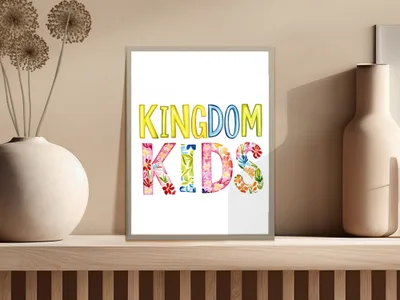 Kingdom Kids text with floral and colorful lettering on a framed print.