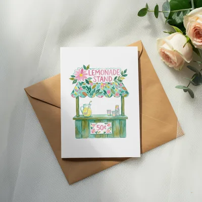 Watercolor illustration of a lemonade stand with flowers, text reads "LEMONADE STAND 50¢".