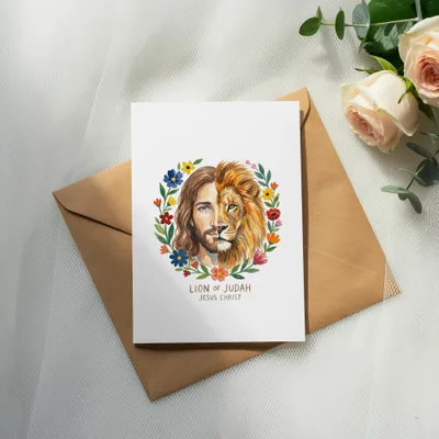 Card with watercolor painting of Jesus Christ's face merging with a lion's, surrounded by flowers.