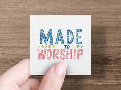 Card with text "MADE TO WORSHIP" in decorative lettering.