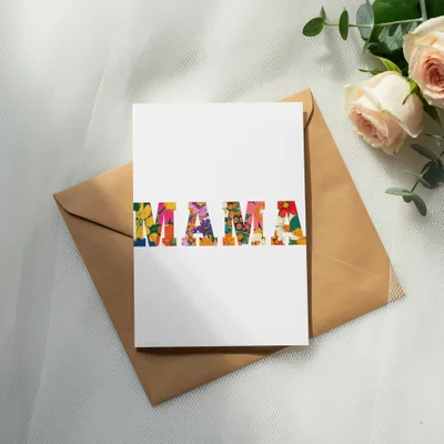 Card with "MAMA" in floral letters on a brown envelope.
