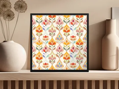 Framed artwork with a colorful, repeating floral pattern on a shelf.