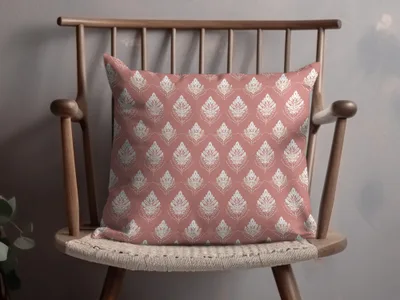Elegant Pink Cushion with Detailed White Patterns