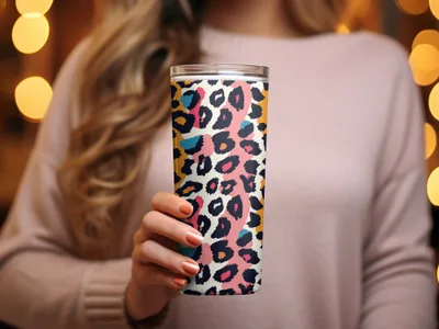 Colorful Leopard Print Tumbler with Lid in Hand