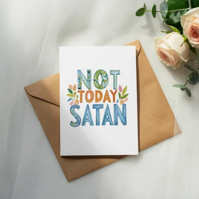 Card with "Not Today Satan" text, floral accents, on envelope with roses.