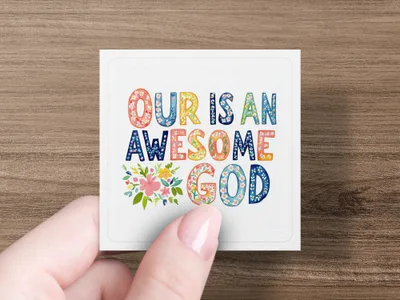 Square sticker with colorful text "OUR IS AN AWESOME GOD" and floral accents.