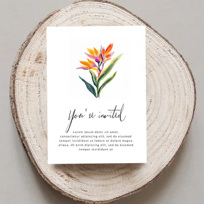 Invitation with watercolor bird of paradise flower and placeholder text.