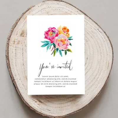 Invitation with watercolor floral bouquet and "You're invited" text.