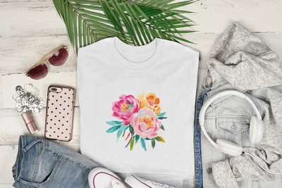 White t-shirt with colorful floral bouquet graphic.