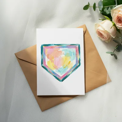Watercolor card with colorful abstract design, on a brown envelope.