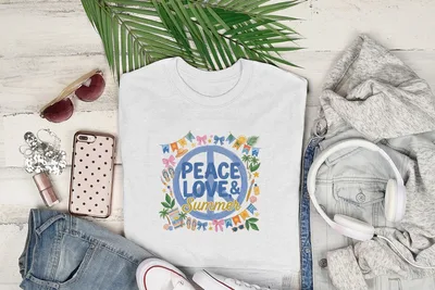 White t-shirt with "Peace Love & Summer" graphic, sunglasses, jeans, and headphones.