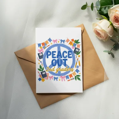 Greeting card with "Peace Out 2nd Graders" text and colorful school supplies.