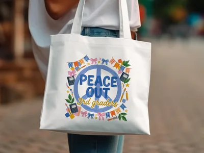 White tote bag with "Peace Out 3rd Graders" text and colorful school icons.