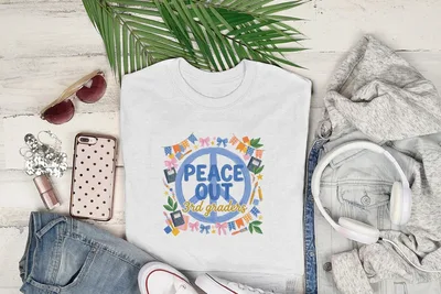 White t-shirt with "Peace Out 3rd Graders" graphic, styled with jeans, headphones, and sunglasses.
