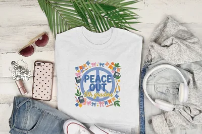 White t-shirt with "Peace Out 5th Graders" text and colorful graphic elements.