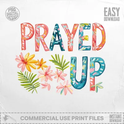 "PRAYED UP" text surrounded by colorful watercolor flowers.