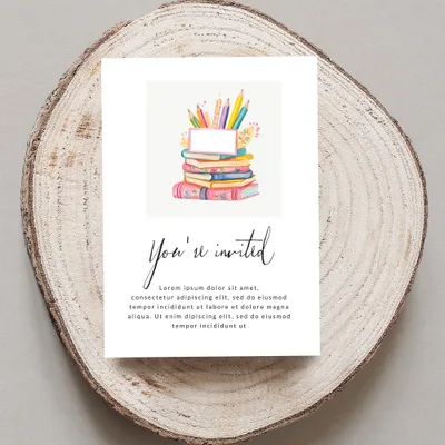 "You're invited" invitation with colorful books and pencils illustration.
