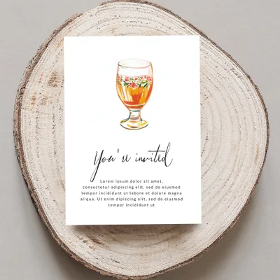 Invitation with a painted cocktail and "You're invited" text.