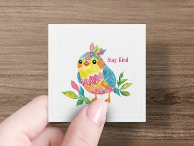 Watercolor bird illustration with text "Stay Kind" on a square card.