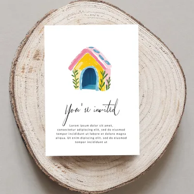 Invitation card with hand-drawn colorful dog house and "You're invited" text.