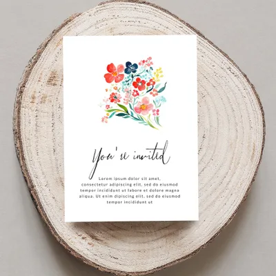 Invitation card with floral design and "You're invited" text.