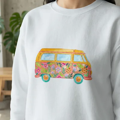 White sweatshirt featuring a colorful watercolor illustration of a vintage van adorned with flowers.