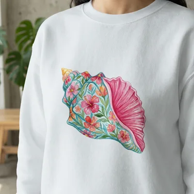 White sweatshirt with a vibrant seashell floral design.