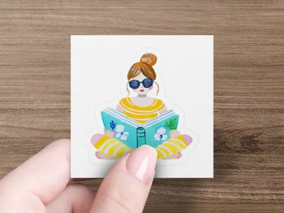 Woman wearing sunglasses reads a striped book.