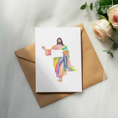Jesus in colorful robe holds blank sign on a card, with roses and eucalyptus.