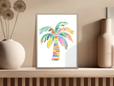 Colorful watercolor palm tree artwork in a framed print.