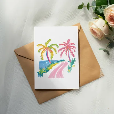 Watercolor card with palm trees and a pink road on a brown envelope.