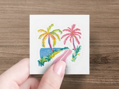 Hand holding a square sticker with a colorful tropical beach scene.