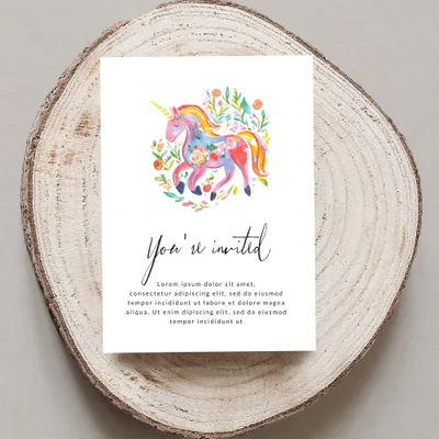 Invitation card with unicorn illustration and placeholder text.
