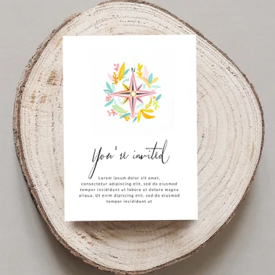 "You're invited" card with compass graphic and placeholder text.