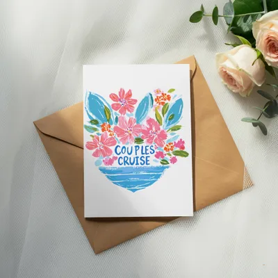 Card with "COUPLES CRUISE" text and floral design on envelope.