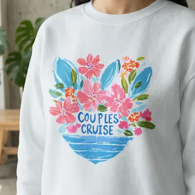 White sweatshirt with "COUPLES CRUISE" printed over a colorful floral bouquet.