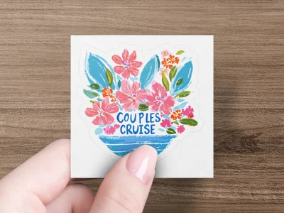Hand holding "Couples Cruise" sticker with floral bouquet.