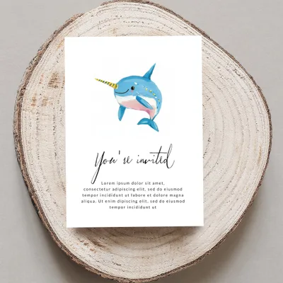Invitation with a cartoon narwhal and "You're invited" text.