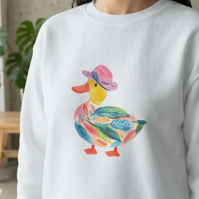 White sweatshirt with colorful watercolor duck wearing a pink hat.