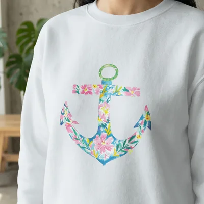 White sweatshirt with a colorful floral anchor graphic.